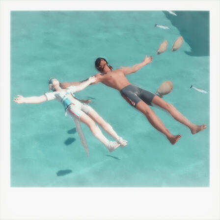 pp and cyrille floating in the ocean